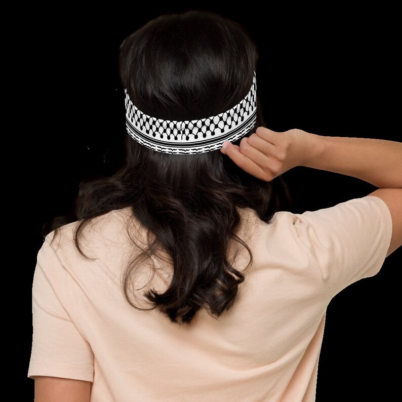 Woman wearing a keffiyeh-inspired headband