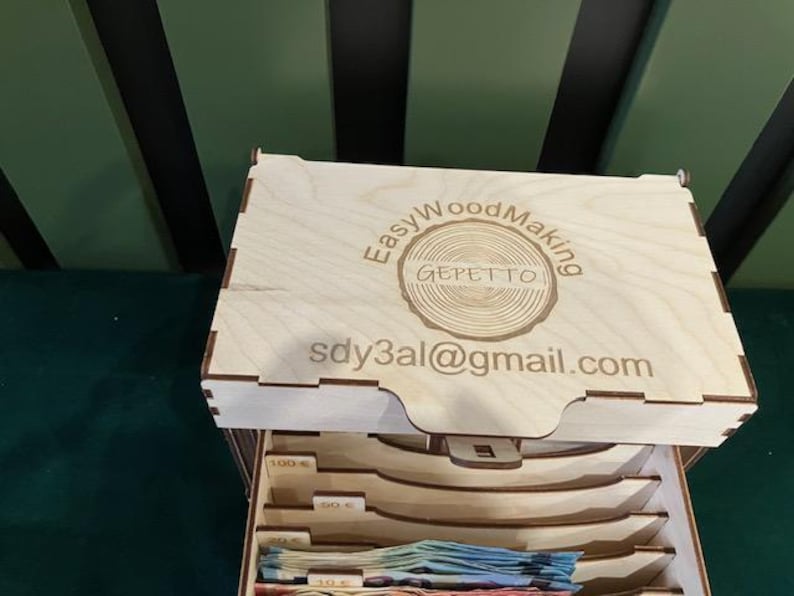 May include: Wooden box with a drawer for storing items. The box is labeled "Easy Wood Making Geppetto sdy3al@gmail.com".