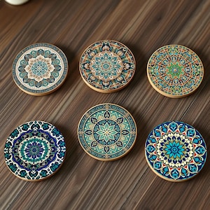 May include: Six round coasters featuring intricate mandala designs in shades of blue, green, and gold. The coasters are made from a durable material and are ideal for protecting your furniture from spills and scratches.