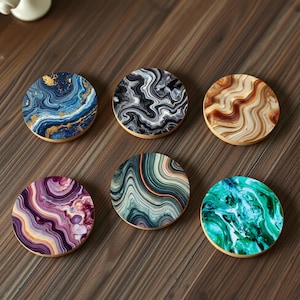 May include: Six round coasters featuring abstract marble-like designs in a variety of colours, including blue, black, brown, purple, green, and teal.
