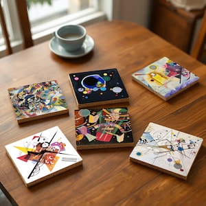 May include: Set of six square coasters featuring abstract art prints in various colors and styles. The coasters are made of cork and have a protective layer on top.