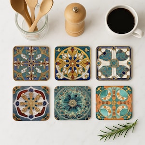 May include: Set of six square coasters with intricate geometric designs in shades of blue, green, gold, and white. The coasters feature a variety of patterns, including floral motifs, geometric shapes, and abstract designs.