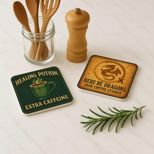 "Pair of D&D cork coasters featuring healing potion coffee mug and crit happens twenty-sided dice."
