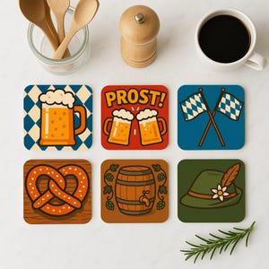 May include: Six square coasters with different designs. The coasters feature a pretzel, a beer stein, a barrel, a hat, two beer mugs with the word "PROST!" and a Bavarian flag.