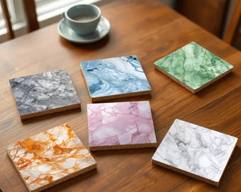 May include: Six different coasters with marble-like patterns. The coasters are made of cork and have a variety of colors, including gray, blue, green, pink, and orange.