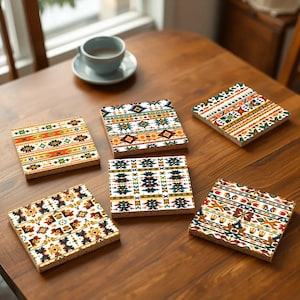 May include: Six colorful coasters with geometric patterns in shades of orange, yellow, green, blue, and red. The coasters are made of cork and have a white background.