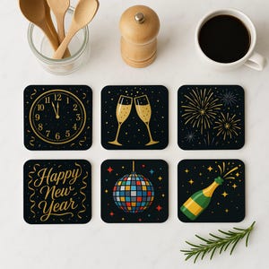 May include: Set of six black square coasters with gold accents. The coasters feature different New Year's Eve themes, including a clock, champagne flutes, fireworks, a disco ball, and a champagne bottle with a popping cork. The text "Happy New Year" is featured on one coaster.