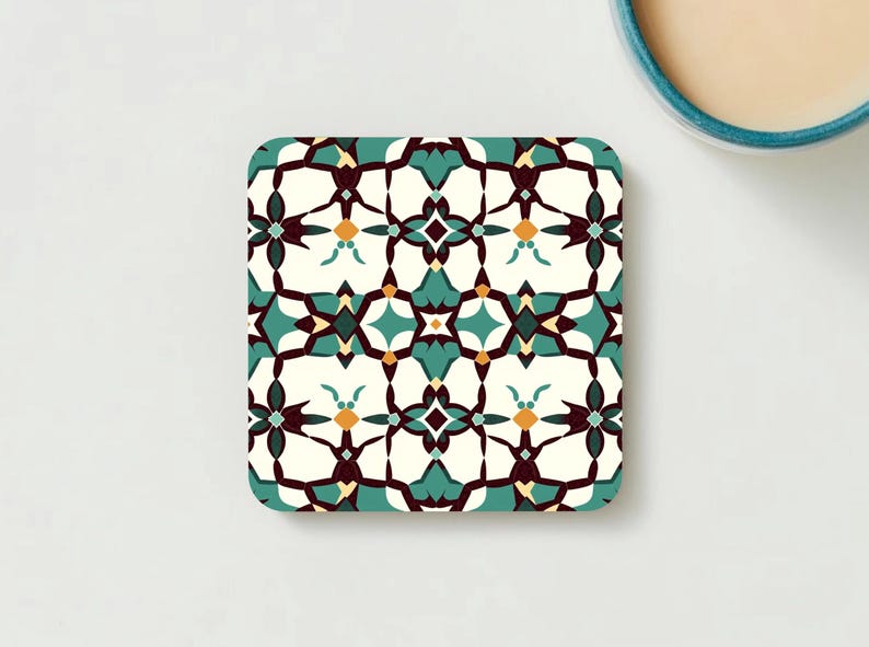Coaster A with a bold teal-and-red floral pattern reminiscent of historic Iznik ceramics, showcasing a cork backing.”