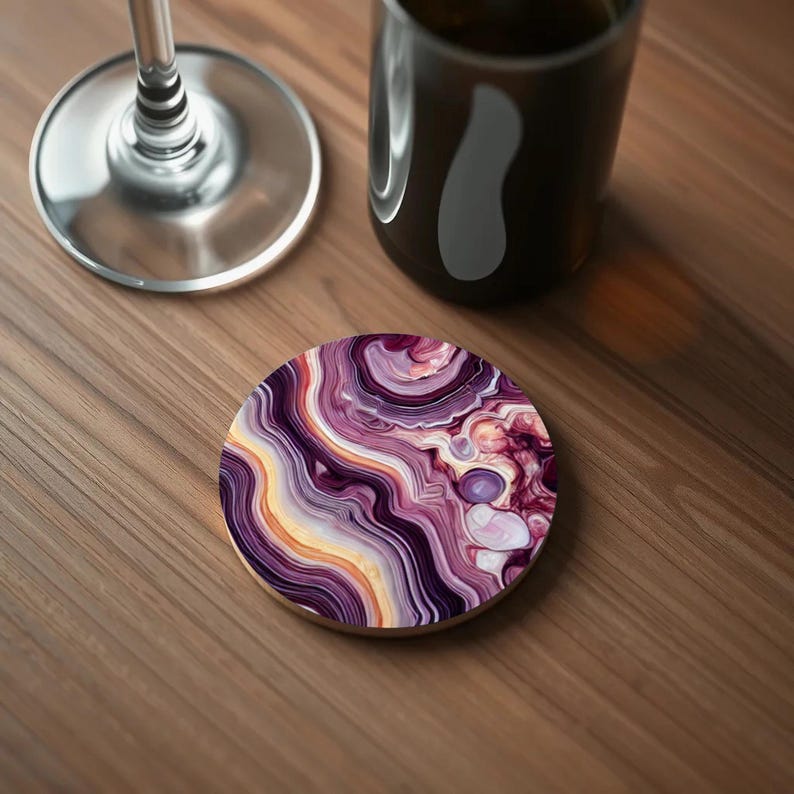 Close-up of a coaster with warm purple and ivory-toned swirls, evoking the natural beauty of polished tiger’s eye gemstones.