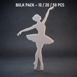 May include: A white ballerina figure in a graceful pose, with one arm raised and the other extended. The ballerina is wearing a tutu. The text "BULK PACK - 10 / 20 / 50 PCS" is at the top.