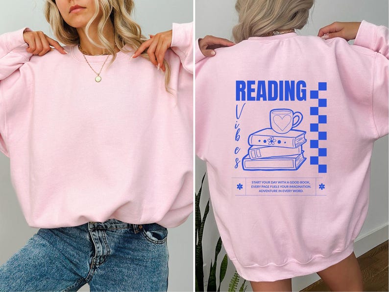 a woman wearing a pink sweatshirt with reading on it