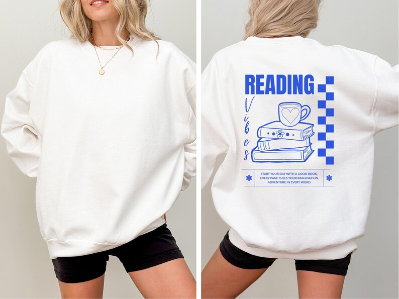a woman wearing a white sweatshirt with reading on it