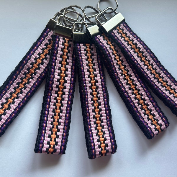Hand woven key fob/wristlet with silver tone hardware