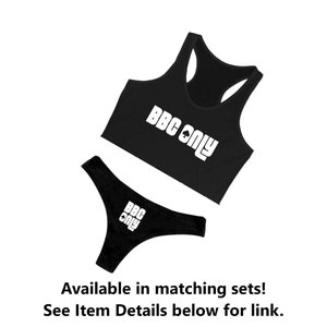 May include: Black crop top and matching underwear with the text "BBC ONLY" in white letters.