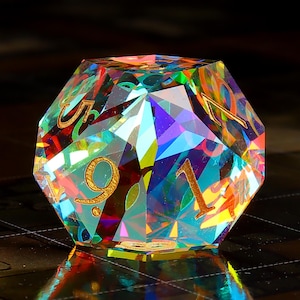 May include: A multi-faceted iridescent crystal d20 dice with gold numbers. The dice is a 20-sided die used in tabletop role-playing games.