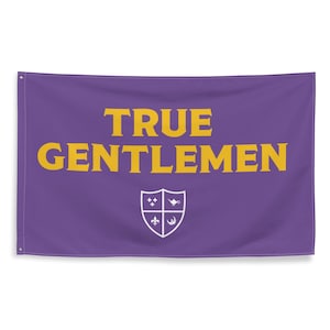 May include: A rectangular purple flag featuring the text TRUE GENTLEMEN in bold yellow capital letters. Below the text is a white shield emblem divided into four quadrants, each containing a small white icon including a lamp and a fleur-de-lis.