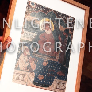 May include: Framed artwork with a detailed illustration of figures in traditional dress. The artwork is in a light wood frame with a white mount. The image has a dark background and the text "ENLIGHTENED PHOTOGRAPHY" is overlaid on the image.