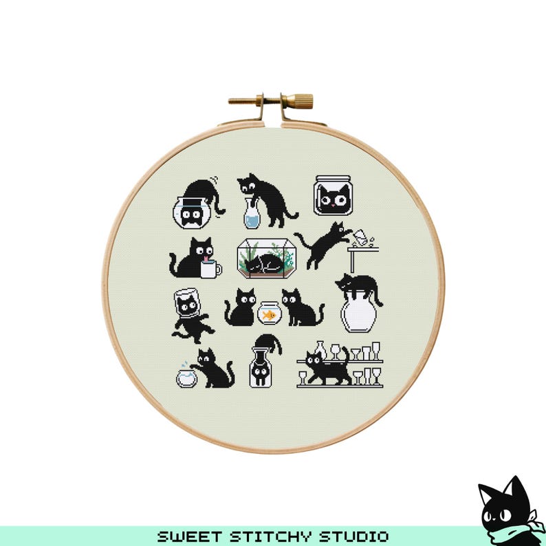 May include: A cross-stitch embroidery hoop featuring a collection of black cat illustrations in various poses. The cats are depicted in a pixelated style, interacting with objects like fishbowls and vases. The text "SWEET STITCHY STUDIO" is at the bottom.