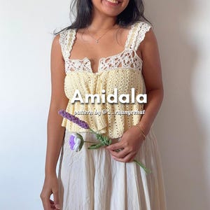 May include: A yellow crochet top with white crochet trim and a ruffled hem. The top is called "Amidala" and the pattern is by "@___ruangrehat".