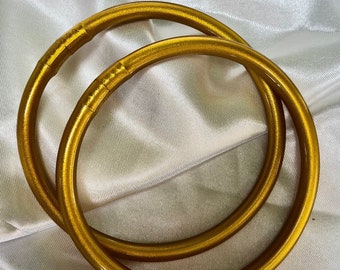 Golden Buddhist bangle