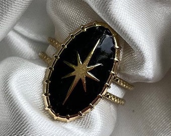 Big black ring with star