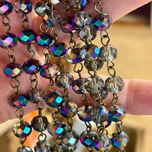 8mm, Blue/ Purple Reflection Transparent, Faceted Glass Bead Chain with Brass Color Wire. Bead Chain. Priced by the foot. Super Sparkle.