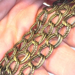 10mm x 8.5mm.  3 Colors Available, Double Link Chain. Flat, Nice Weight and Feel. Unwelded.   Priced By The Foot.