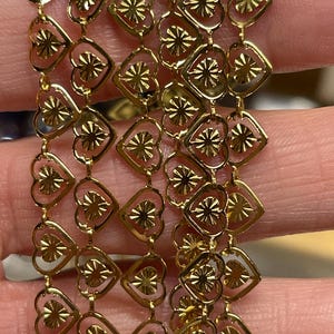 Gold Heart Chain. 8 x 6mm. The metal is plated steel. Priced by the foot
