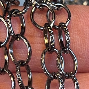 4 Colors Available, Cable Chain. Textured, Flat, and Oval.  8x6x1mm, Priced By The Foot. Colors