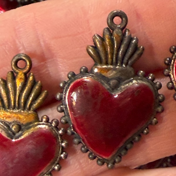 Antiqued, Ancient-looking Metal. Small Red Heart Double-Sided Milagro.  Bronze/Rust-Colored Metal.  20.3mm tall x 13.8mm Wide. 1 per Order.