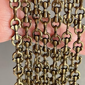 Handmade Antiqued Bronze Bar Chain. Bars are 16 mm, and the links are 6.3mm long. Nice weight, hangs beautifully. Priced by the foot.