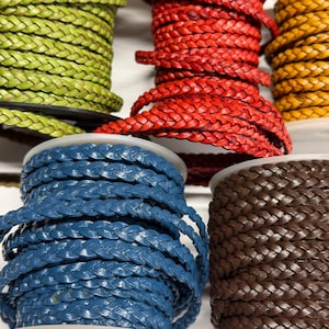 Genuine Braided Leather Cord. 5mm Flat Braid.Available in 6 Colors priced by the foot.