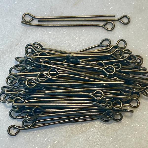 Antiqued bronze Color Iron Eye Pins, 30mm (1 1/4″inches) Opening 2mm. 21 Gauge Wire. Perfect Thickness and Strength. 100 Per Order