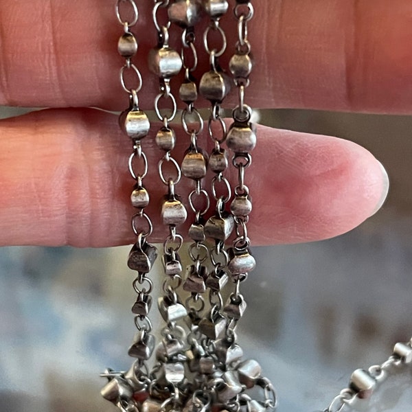 Excellent Quality,  Alternating discs in two sizes: 5.8mm x 2.5mm and 8mm x 3.7mm, Delicate Chain. Priced By The Foot.