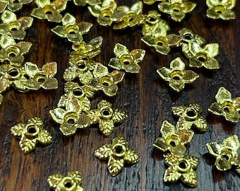 Four Leaf Antique Gold Bead Caps.   100 Per Order     B2-D1