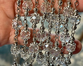7.6mm, Crystal Clear and Silver. Faceted Glass and Silver Beads and Caps on Silver Wire. Priced By the Foot.