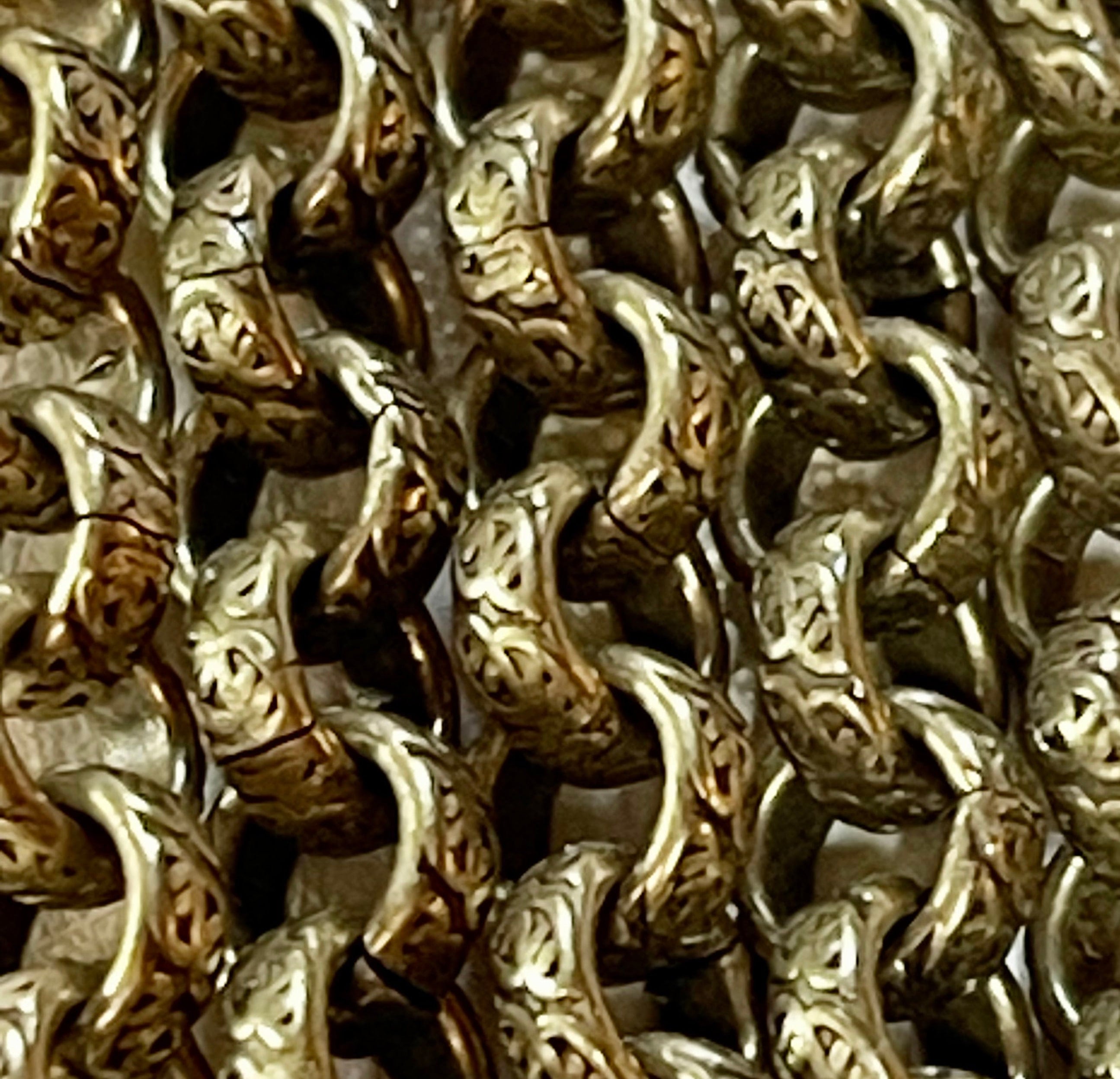 This Lovely Antique Brass Textured Chain is 6.3mm.  Priced By The Foot.   839