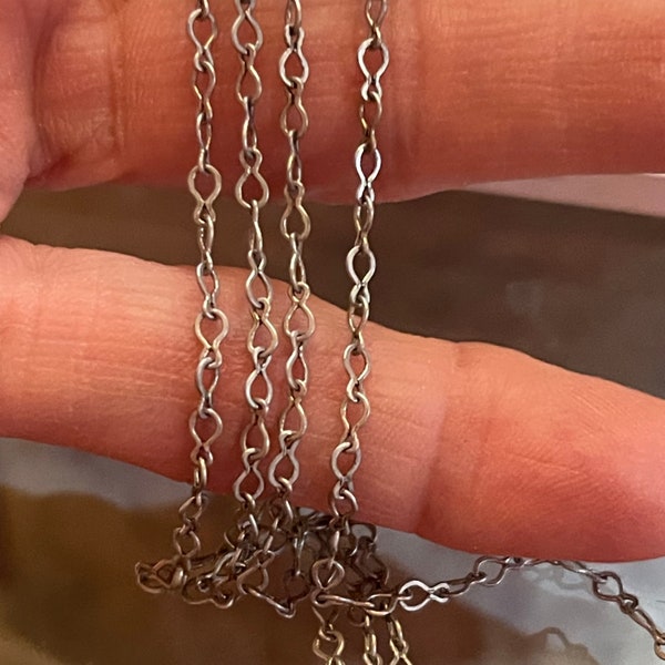 This dainty, contemporary design antiqued silver chain has 4x3mm Teardrop links made from smooth, flattened 24 gauge  Sold by the foot