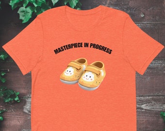 T-shirt zwangerschapsaankondiging: babyslofjes, meesterwerk in uitvoering