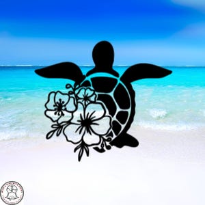 May include: Black sea turtle silhouette with a floral design, set against a beach scene with a blue sky and ocean. The turtle has outstretched flippers and a detailed shell pattern. The flowers are white with black outlines.