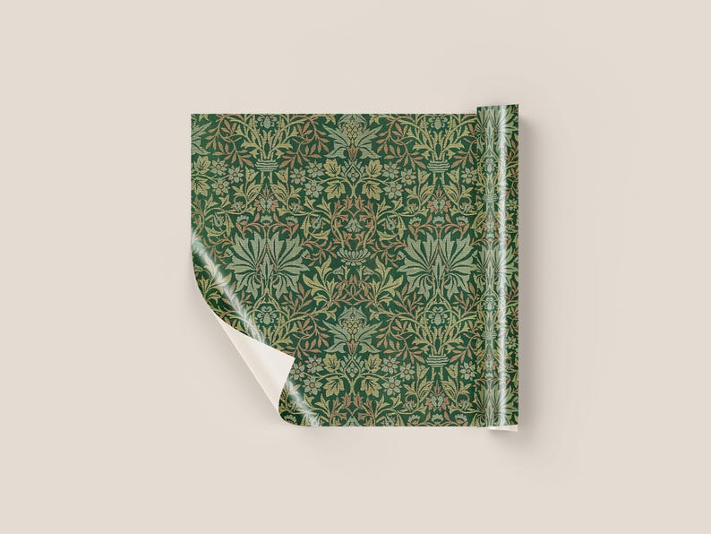 a square-shaped pattern with a repeating floral design in shades of green and brown.