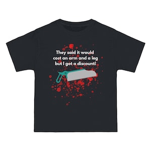 Tshirt with amputee joke including blood, bone saw, arm and a leg