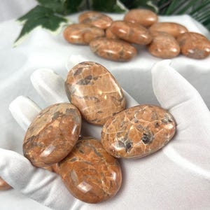 Red Moonstone Palm Stone: Polished Crystal for Anxiety Relief