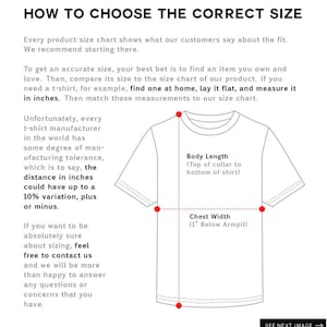 May include: Diagram showing how to measure a t-shirt for size. The diagram shows a white t-shirt with red dots marking the points to measure. The measurements are labeled "Body Length (Top of collar to bottom of shirt)" and "Chest Width (1" Below Armpit)".
