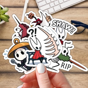 May include: A collection of die-cut stickers featuring characters from the video game Hollow Knight. The stickers include various characters in different poses, with speech bubbles and text like "SHAW!" and "RIP".