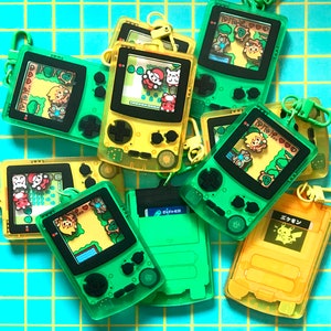 Amuletos de agitador de Game Boy Color