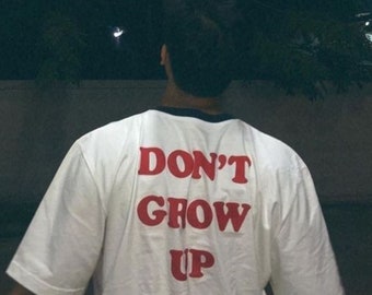 Don't Grow Up Unisex Tshirt