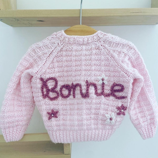 0-3 Months Personalised hand embroidered baby name cardigan. Hand knitted personalised baby cardigan.