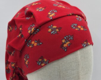 Super Soft and Stretchable Scrub Hat with Elastic . Red with little yellow flower clusters.