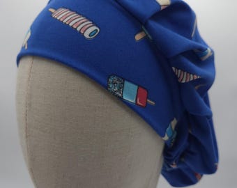 Scrub hat: Super Soft Stretch Knit, blue with assorted candy treats.